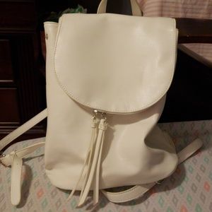 White purse back pack